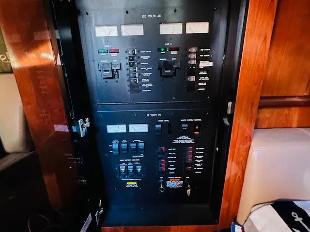 Slide: The Image of Electrical panel inside 2004 Sea Ray 390 Sundancer yacht cabin. - 21