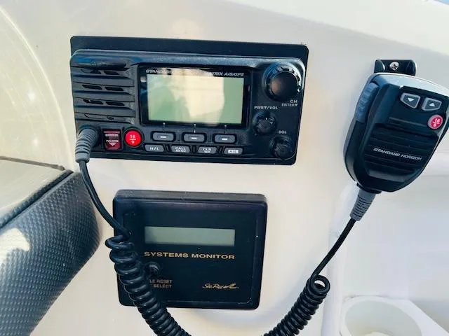 Slide: The Image of Control panel of a 2004 Sea Ray 390 Sundancer boat with radio and systems monitor. - 8