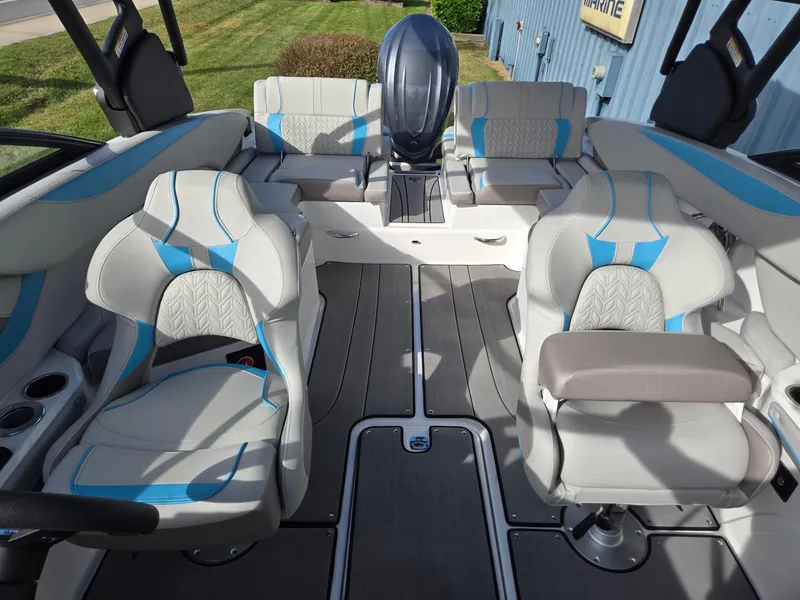 Slide: The Image of 2025 Hurricane SunDeck 2600 OB interior with modern seating and sleek design. - 13