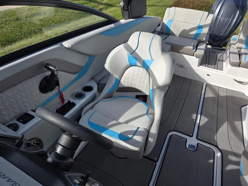 Slide: The Image of 2025 Hurricane SunDeck 2600 OB interior with modern seating and sleek design. - 15