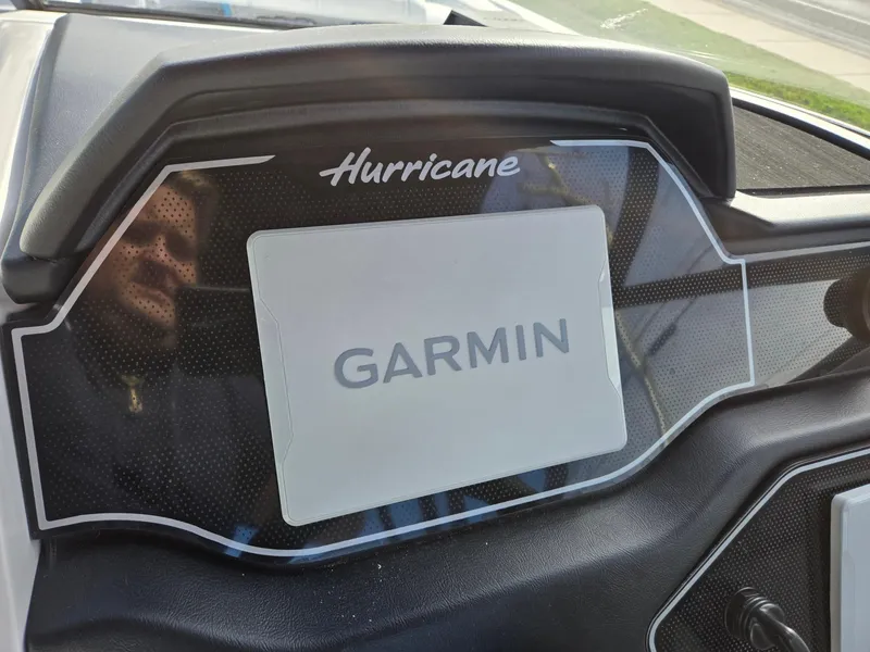 Slide: The Image of Dashboard of 2025 Hurricane SunDeck 2600 OB with Garmin display. - 17