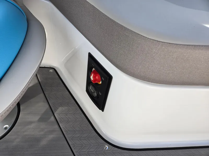 Slide: The Image of 2025 Hurricane SunDeck 2600 OB boat interior with safety switch and seating. - 24