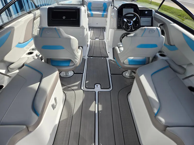 Slide: The Image of 2025 Hurricane SunDeck 2600 OB boat interior with modern seating and sleek design. - 36