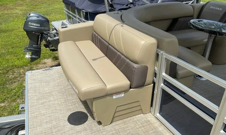 Slide: The Image of 2025 Sylvan Mirage 820 CRB boat with beige seating and Yamaha motor. - 3