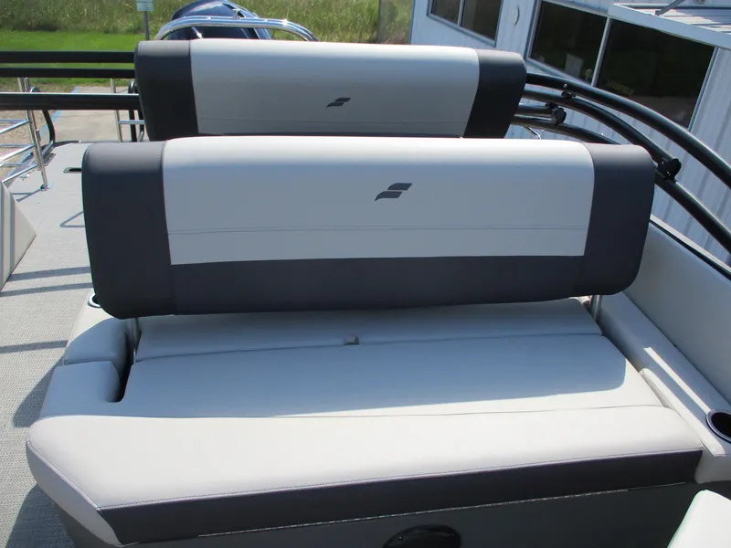 Slide: The Image of Starcraft EXS-3DL 2025 boat seats with sleek gray and white design. - 8
