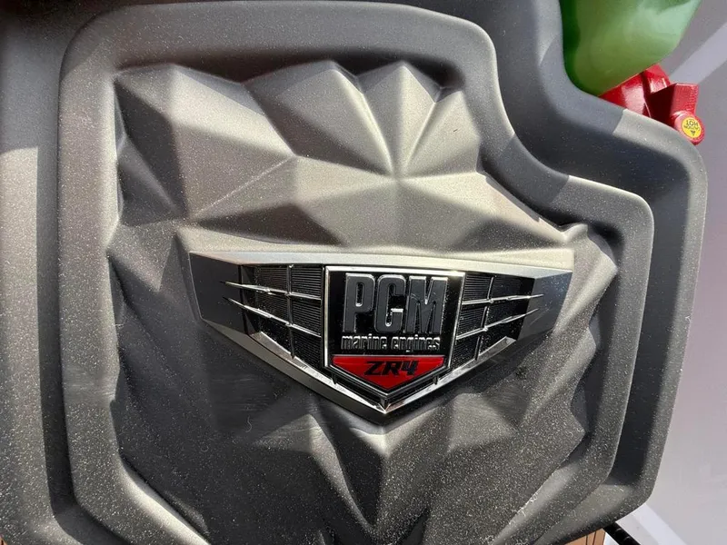 Slide: The Image of PCM Marine Engines ZR4 emblem on 2025 Nautique Ski 200 Open Bow. - 35