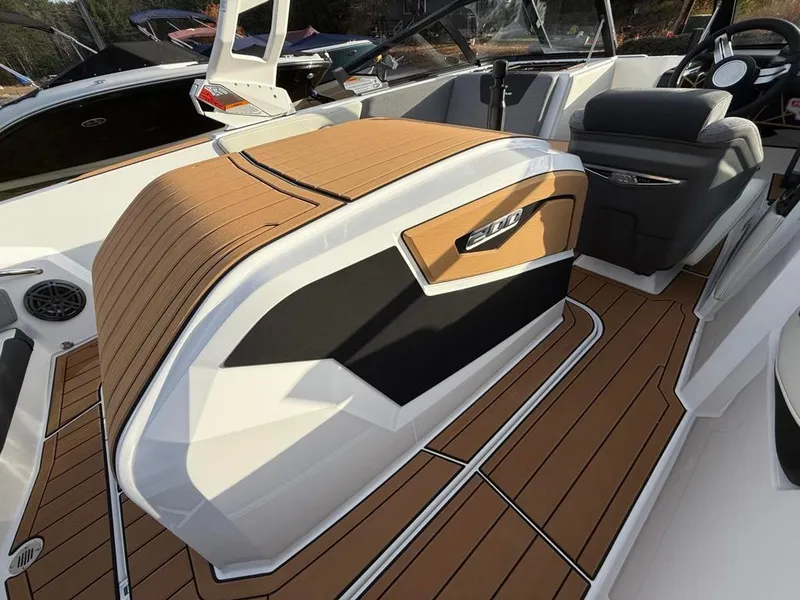 Slide: The Image of 2025 Nautique Ski 200 Open Bow interior with sleek design and premium seating. - 37