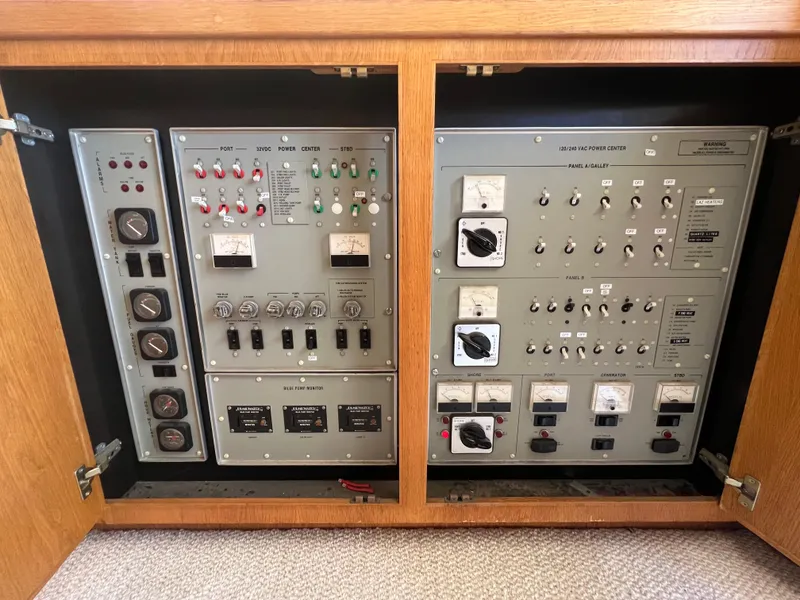 Slide: The Image of Electrical control panel of a 1989 Bertram 50 Convertible yacht. - 13