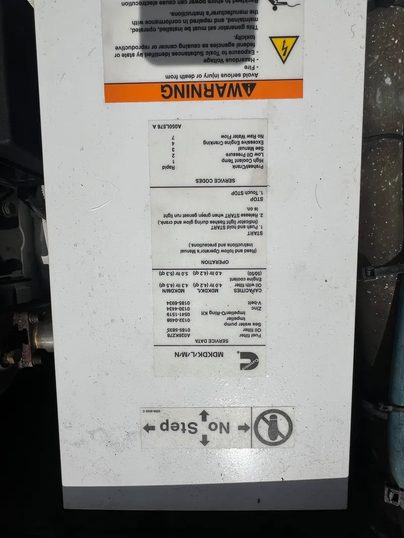 Slide: The Image of Warning label on machinery panel, Bertram 50 Convertible, 1989 model. - 43