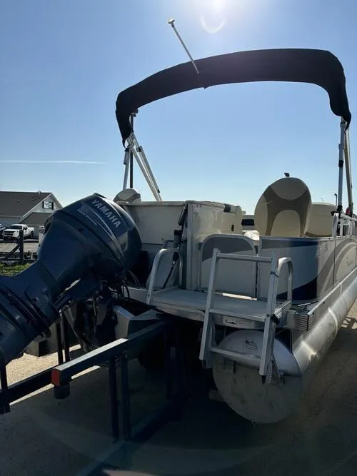 Slide: The Image of 2008 Bennington 2075GSi pontoon boat with Yamaha outboard motor, docked under sunny sky. - 5