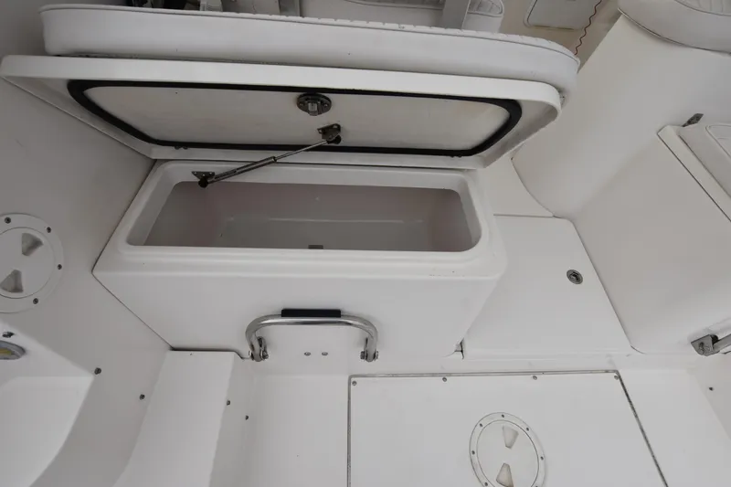 Slide: The Image of Open storage compartment on 2007 Seaswirl Striper 2901 Walkaround O/B boat. - 15