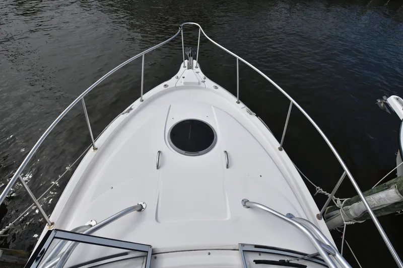 Slide: The Image of 2007 Seaswirl Striper 2901 Walkaround O/B boat deck view on water. - 24