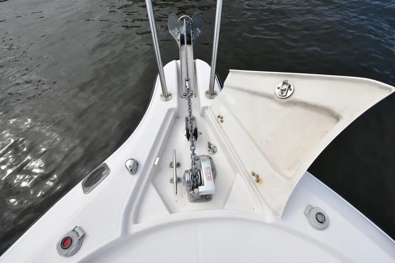 Slide: The Image of 2007 Seaswirl Striper 2901 Walkaround O/B boat anchor and deck view. - 28