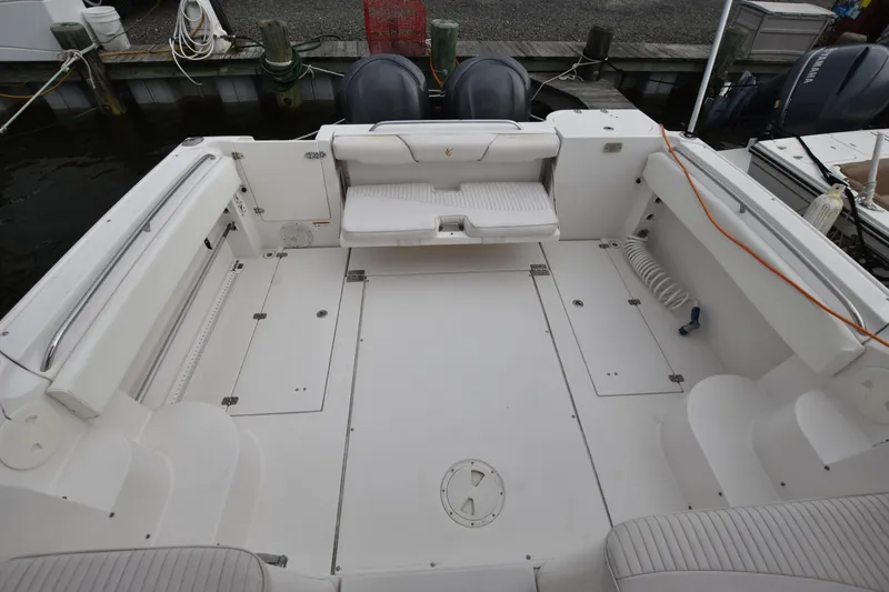 Slide: The Image of 2007 Seaswirl Striper 2901 Walkaround O/B boat deck with seating and storage compartments. - 6
