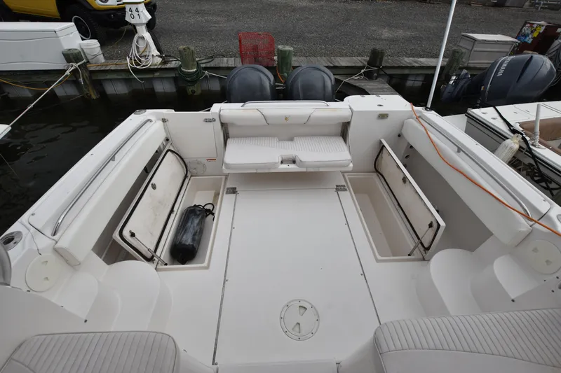 Slide: The Image of 2007 Seaswirl Striper 2901 Walkaround O/B boat interior with seating and storage compartments. - 7