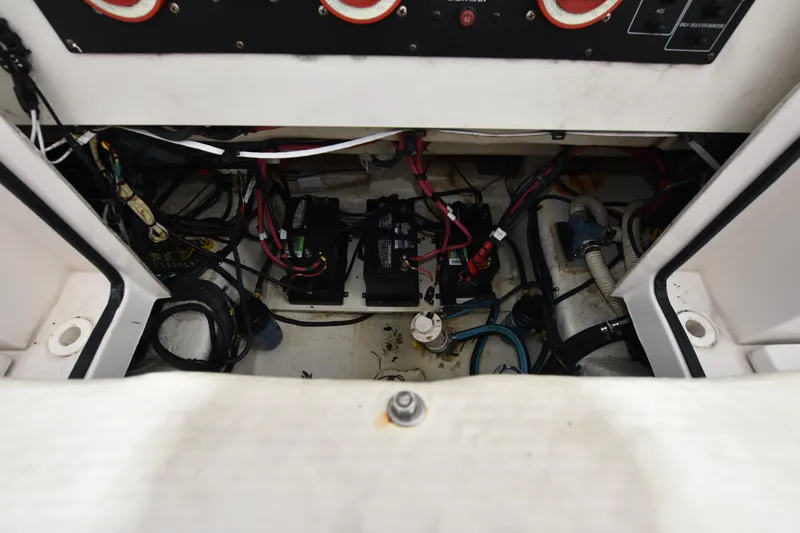 Slide: The Image of 2007 Seaswirl Striper 2901 Walkaround O/B engine compartment with wiring and components. - 9