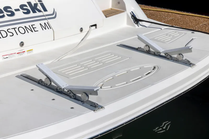 Slide: The Image of 2016 Sea Ray 510 Sundancer swim platform with jet ski mounts. - 25