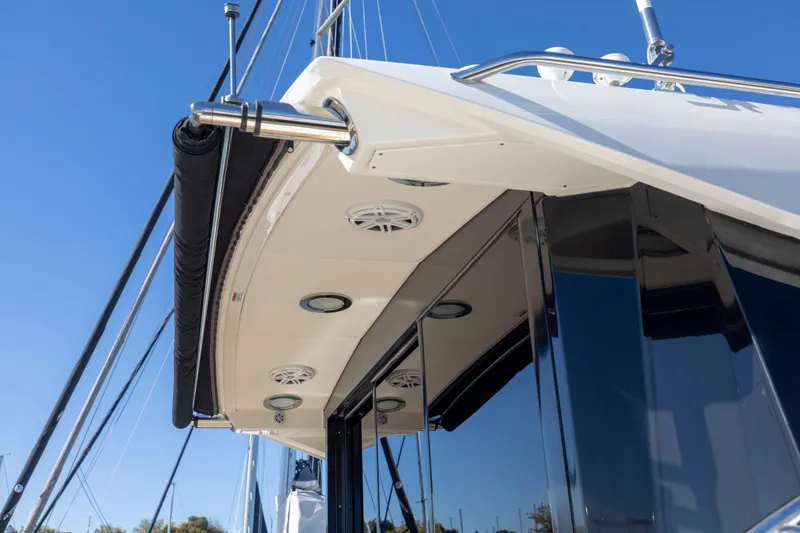 Slide: The Image of 2016 Sea Ray 510 Sundancer yacht, exterior view with sleek design and modern features. - 34