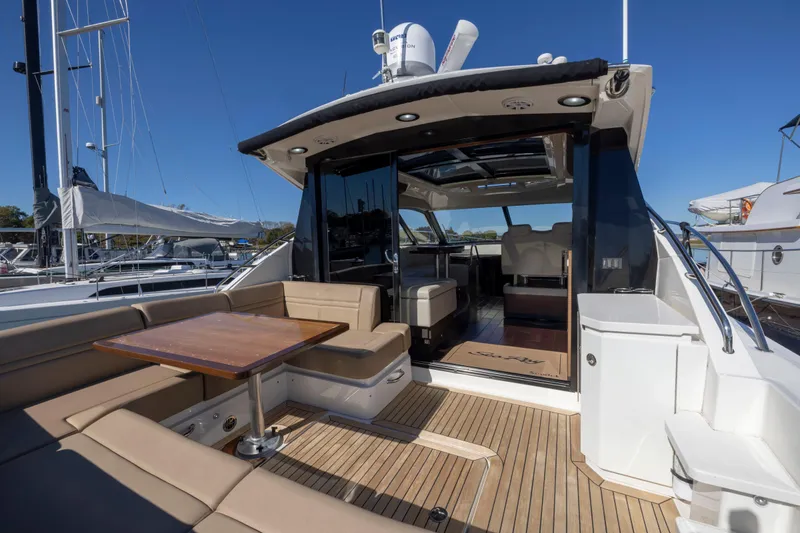 Slide: The Image of 2016 Sea Ray 510 Sundancer yacht with spacious deck and luxurious seating. - 36