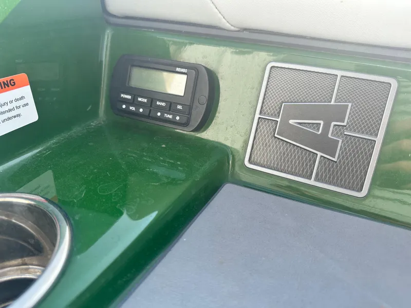 Slide: The Image of 2022 Axis A22 boat dashboard with control panel and logo. - 9