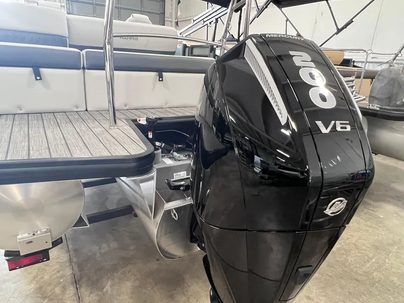 Slide: The Image of 2024 Harris Sunliner 230 with powerful V6 engine in showroom. - 15