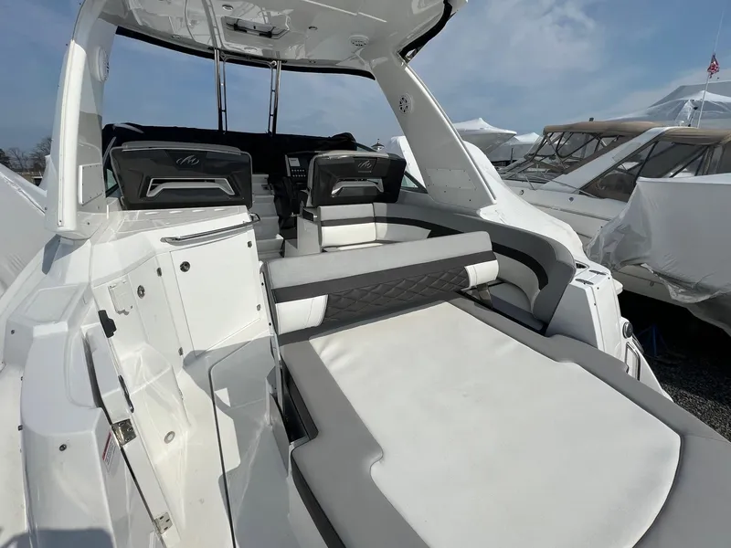 Slide: The Image of 2020 Monterey 345 SY boat interior with spacious seating and modern design. - 21