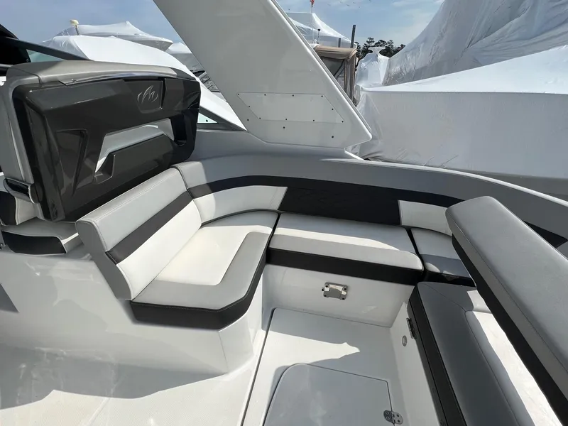 Slide: The Image of 2020 Monterey 345 SY boat interior with sleek seating and modern design. - 28
