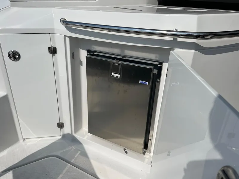 Slide: The Image of Stainless steel mini fridge on 2020 Monterey 345 SY boat deck. - 30