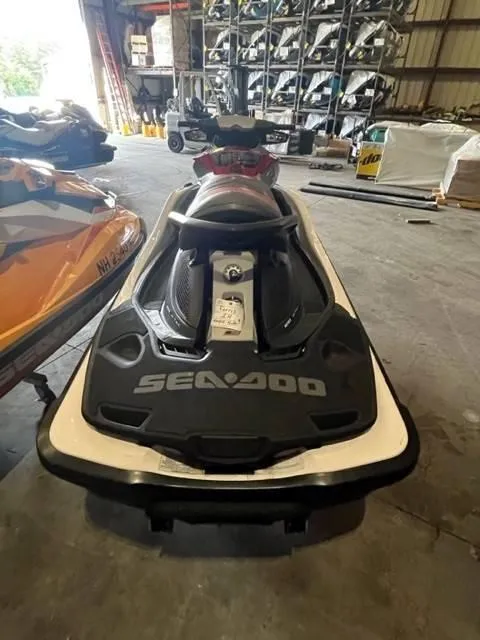 Slide: The Image of 2011 Sea-Doo GXT iS 215 jet ski in a storage facility. - 5