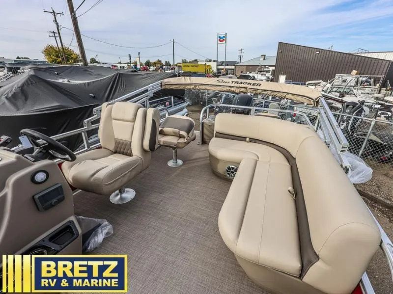 Slide: The Image of 2025 BASS BUGGY 18 DLX pontoon boat interior at Bretz RV & Marine dealership. - 10