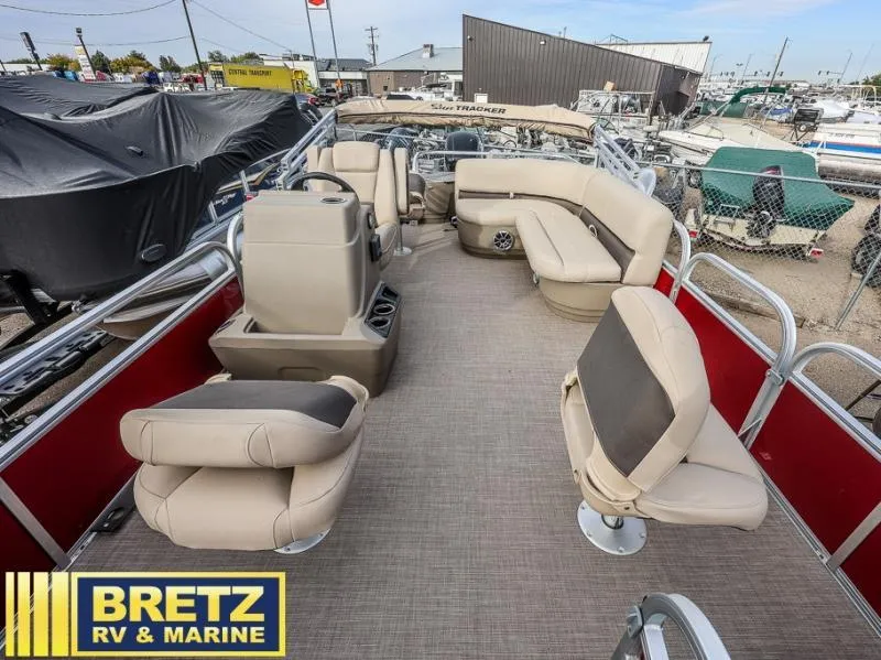 Slide: The Image of 2025 BASS BUGGY 18 DLX pontoon boat interior at Bretz RV & Marine dealership. - 12