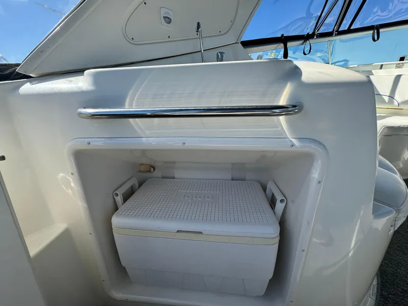Slide: The Image of 2008 Bayliner 300 Ciera interior with built-in cooler storage compartment. - 12