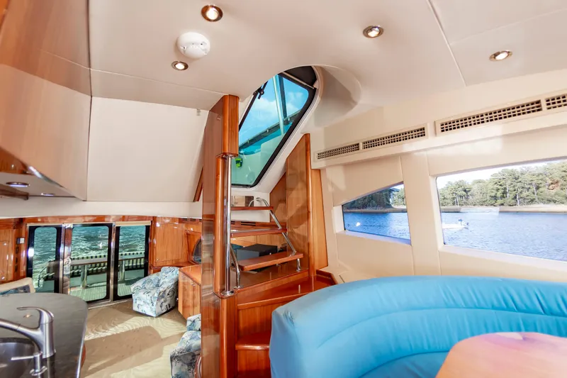 Slide: The Image of Luxurious interior of 2007 Hatteras 64 Motor Yacht with scenic water view. - 29