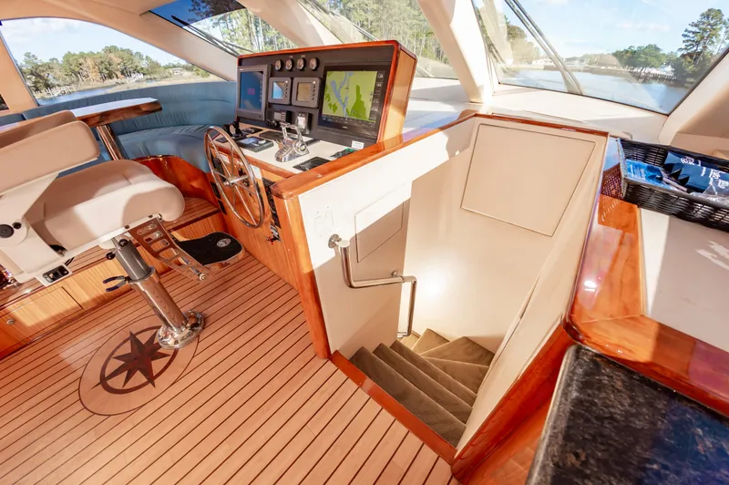 Slide: The Image of Interior helm of 2007 Hatteras 64 Motor Yacht with navigation equipment and seating. - 40