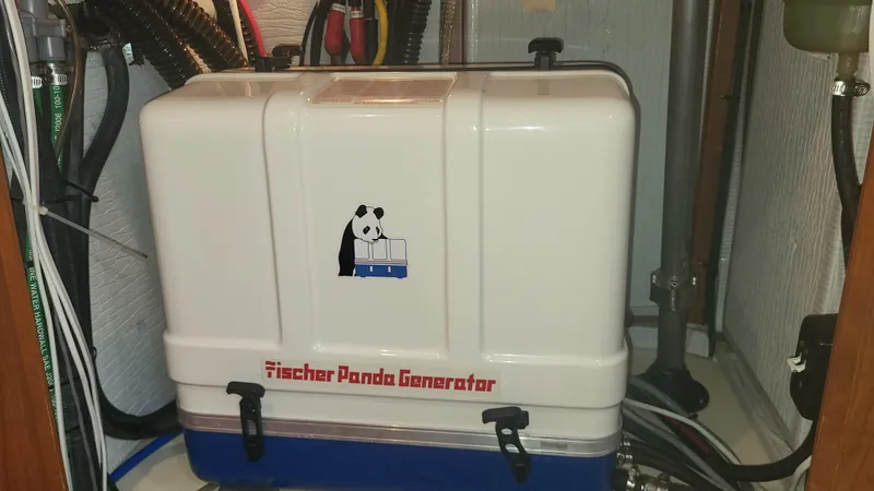 Slide: The Image of Fischer Panda Generator in a 2009 Hunter 50 CC boat engine room. - 16