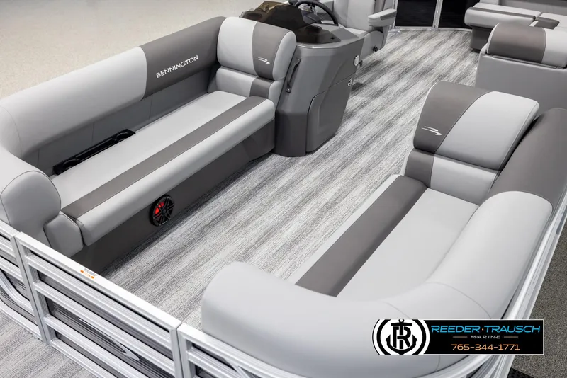 Slide: The Image of 2025 Bennington 21 SLSE pontoon boat interior with gray seating and modern design. - 10