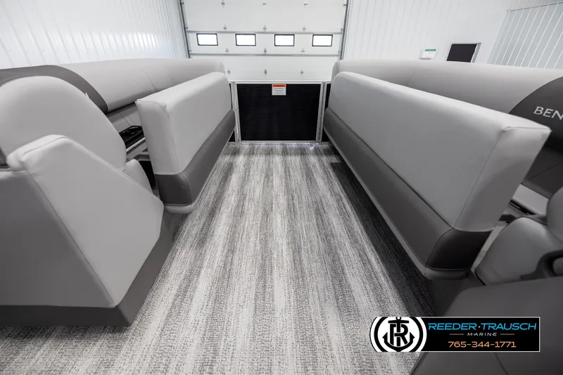Slide: The Image of 2025 Bennington 21 SLSE pontoon boat interior with gray seating and flooring. - 19