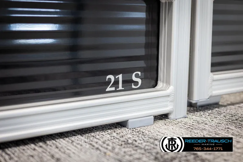 Slide: The Image of 2025 Bennington 21 SLSE boat detail with Reeder-Trausch Marine logo. - 43