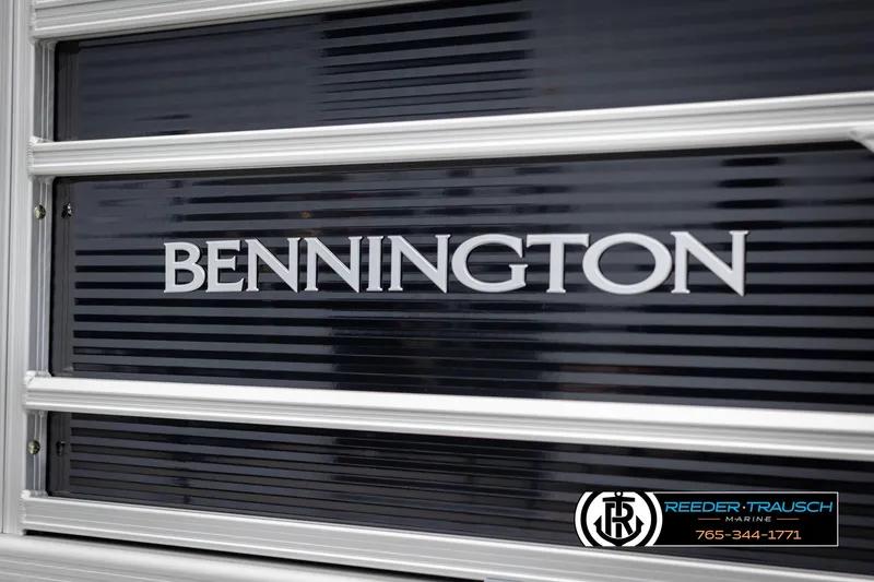 Slide: The Image of Bennington 21 SLSE 2025 boat logo with Reeder-Trausch Marine contact details. - 44