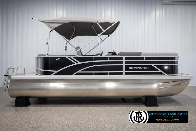 Slide: The Image of 2025 Bennington 21 SLSE pontoon boat with canopy in showroom. - 5