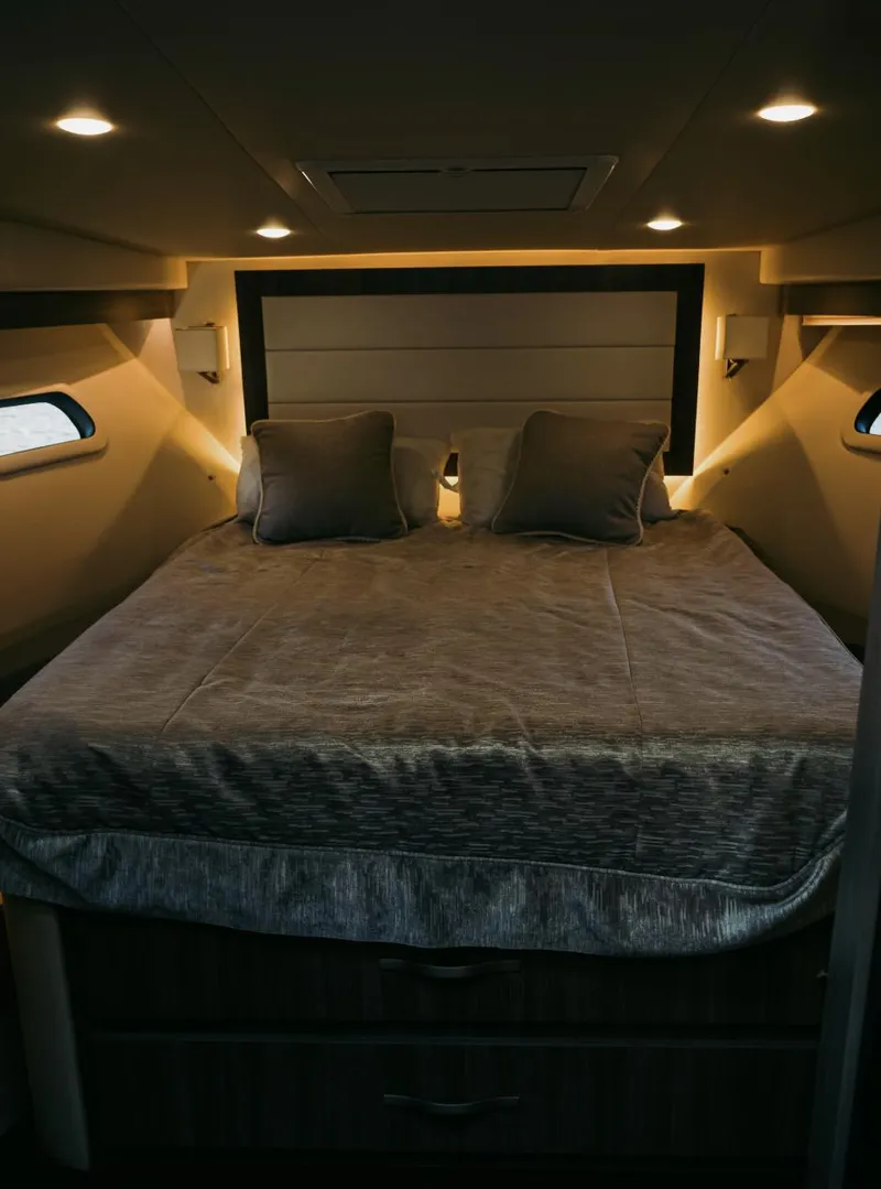 Slide: The Image of Luxurious bedroom interior of 2021 Regal 38 Grande Coupe yacht. - 14