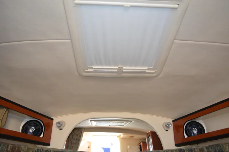 Slide: The Image of Interior ceiling of 2004 Sea Ray 280 Sundancer with skylight and fans. - 45