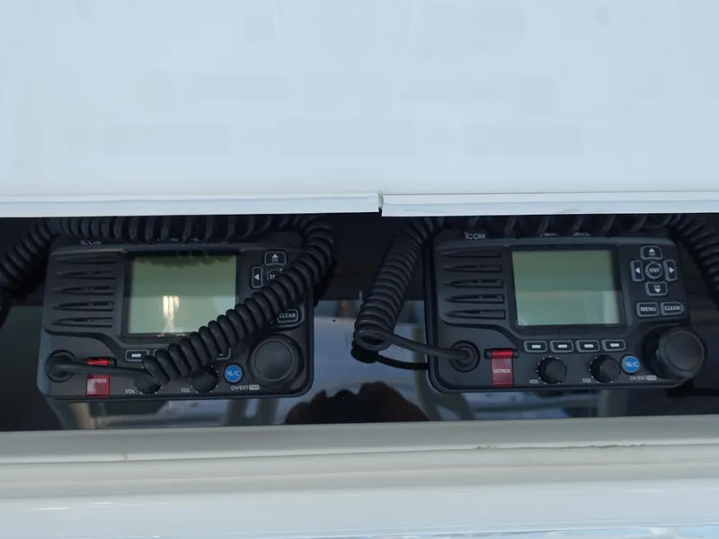 Slide: The Image of Dual marine radios on a 2016 Regulator 41 boat dashboard. - 16