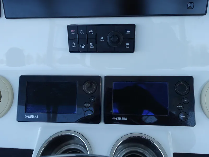 Slide: The Image of Control panel of a 2016 Regulator 41 boat with Yamaha displays. - 18