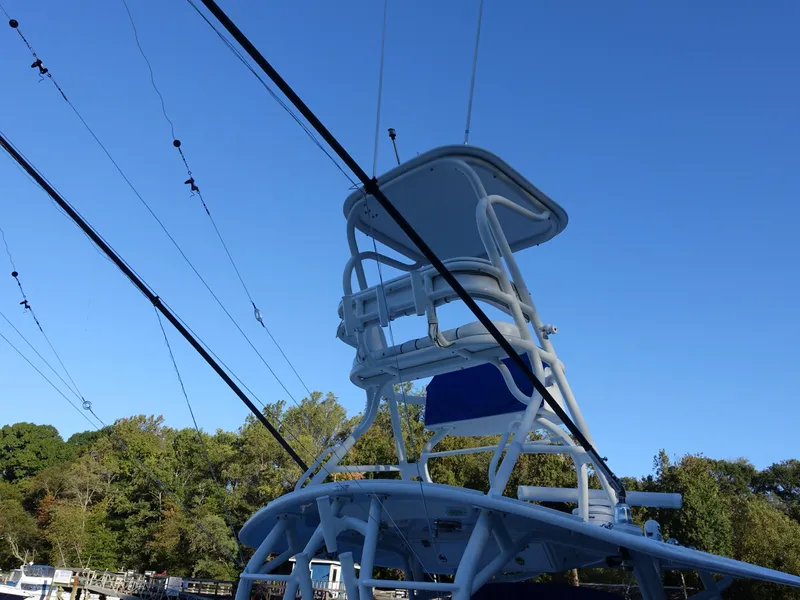 Slide: The Image of Regulator 41 boat tower with fishing rods against clear blue sky, 2016 model. - 6