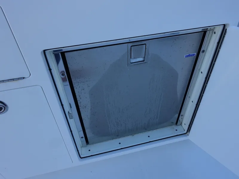 Slide: The Image of Regulator 41 boat storage compartment, 2016 model, with stainless steel door. - 8