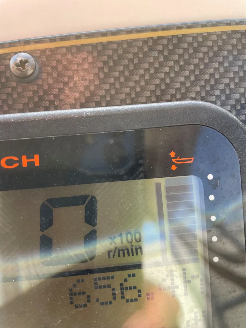 Slide: The Image of Close-up of 2011 Grady-White 275 boat tachometer display. - 9