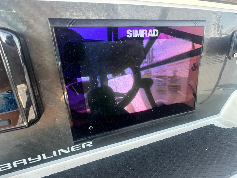 Slide: The Image of Simrad display on 2022 Bayliner DX 2000 boat dashboard. - 5