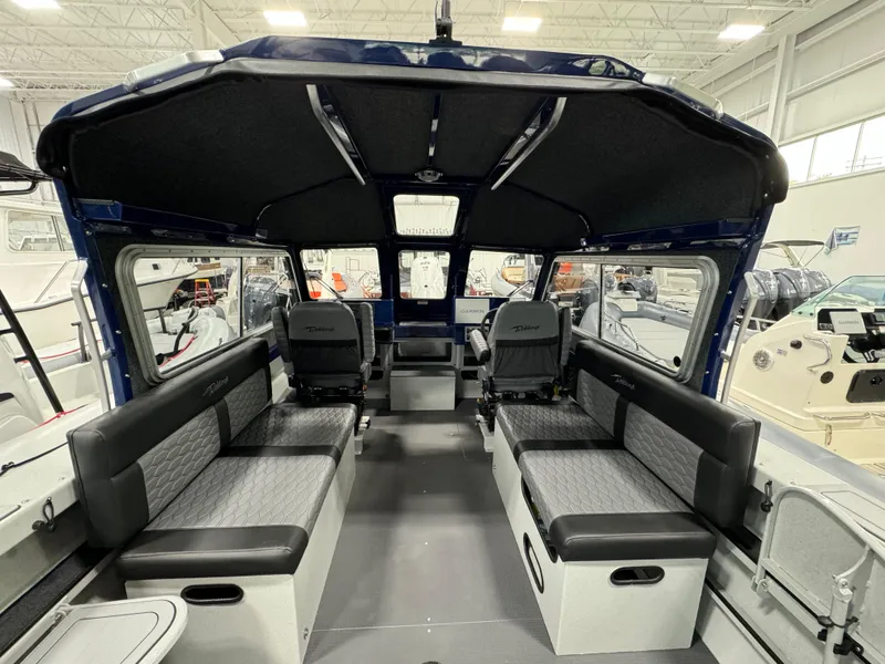 Slide: The Image of 2025 Weldcraft 240 Maverick DV boat interior with seating, in stock at showroom. - 25
