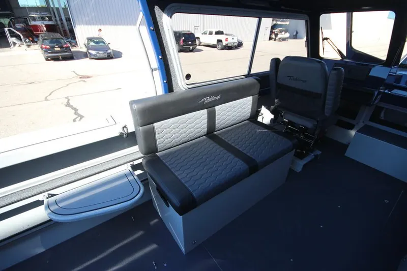 Slide: The Image of 2025 Weldcraft 240 Maverick DV boat interior with seating and modern design. - 28